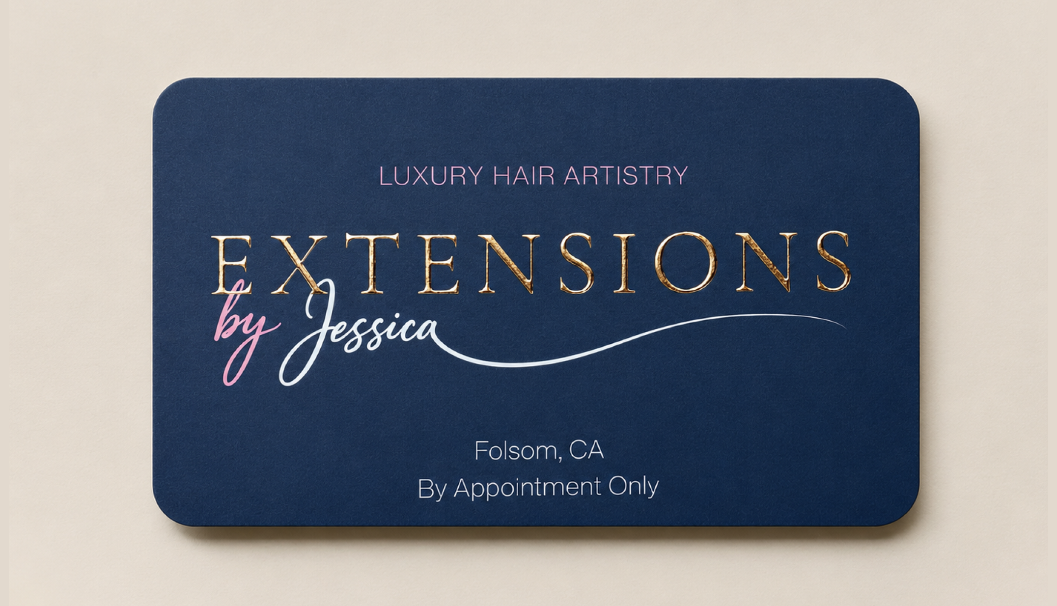 Foil-stamped business card on navy
